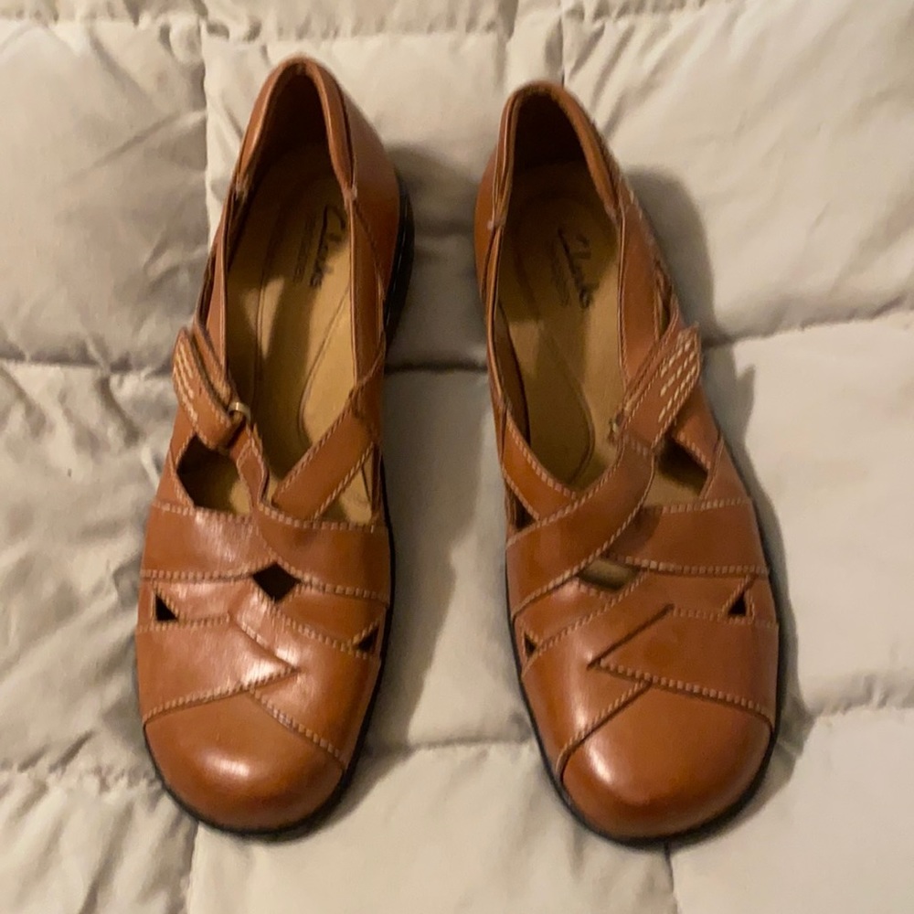 Clarks slip on leather flat shoe. Never worn. Size 8